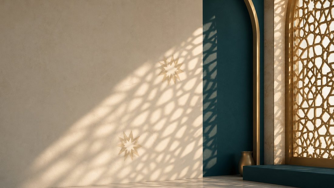 Carved mashrabiya screen casting geometric light across a sand-coloured wall
